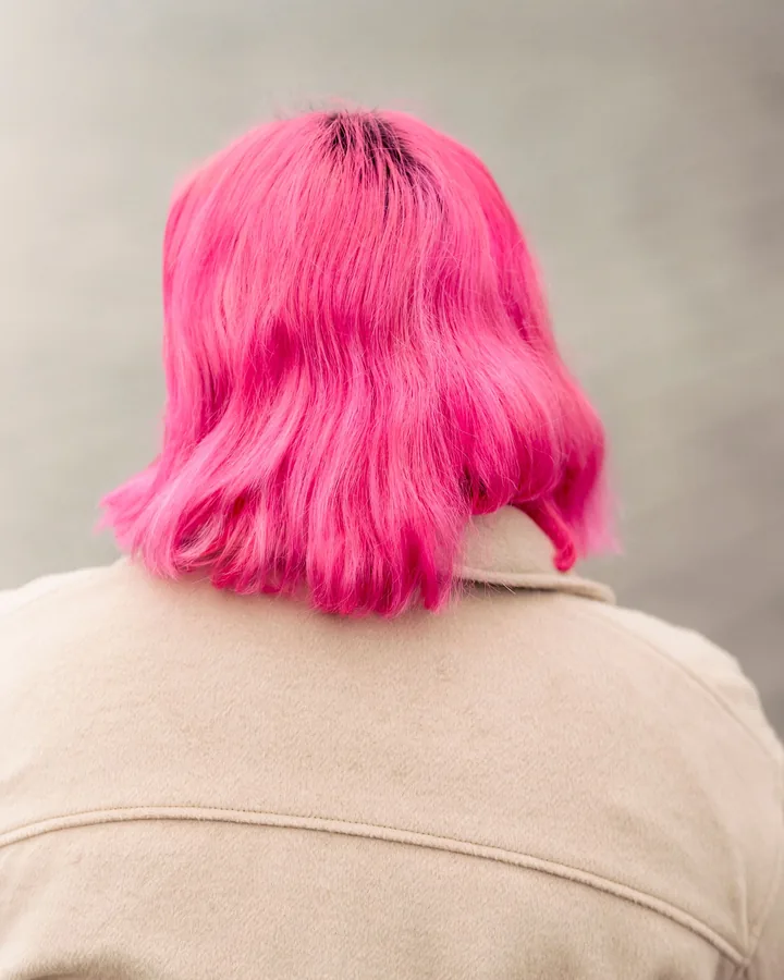 Bright bubblegum-pink bob from behind