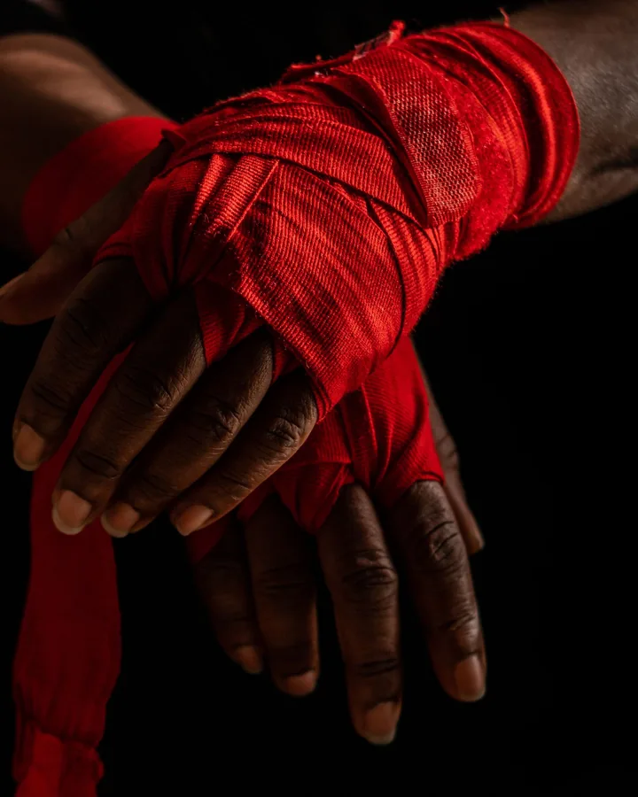 Red hand wraps going on before class
