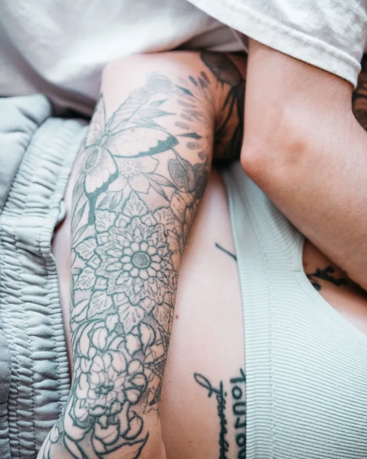 Fine line floral and ornamental forearm by Wren
